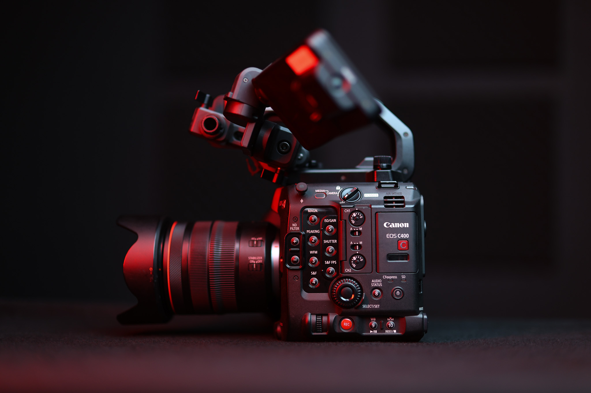 Canon cinema camera in dramatic low-key lighting