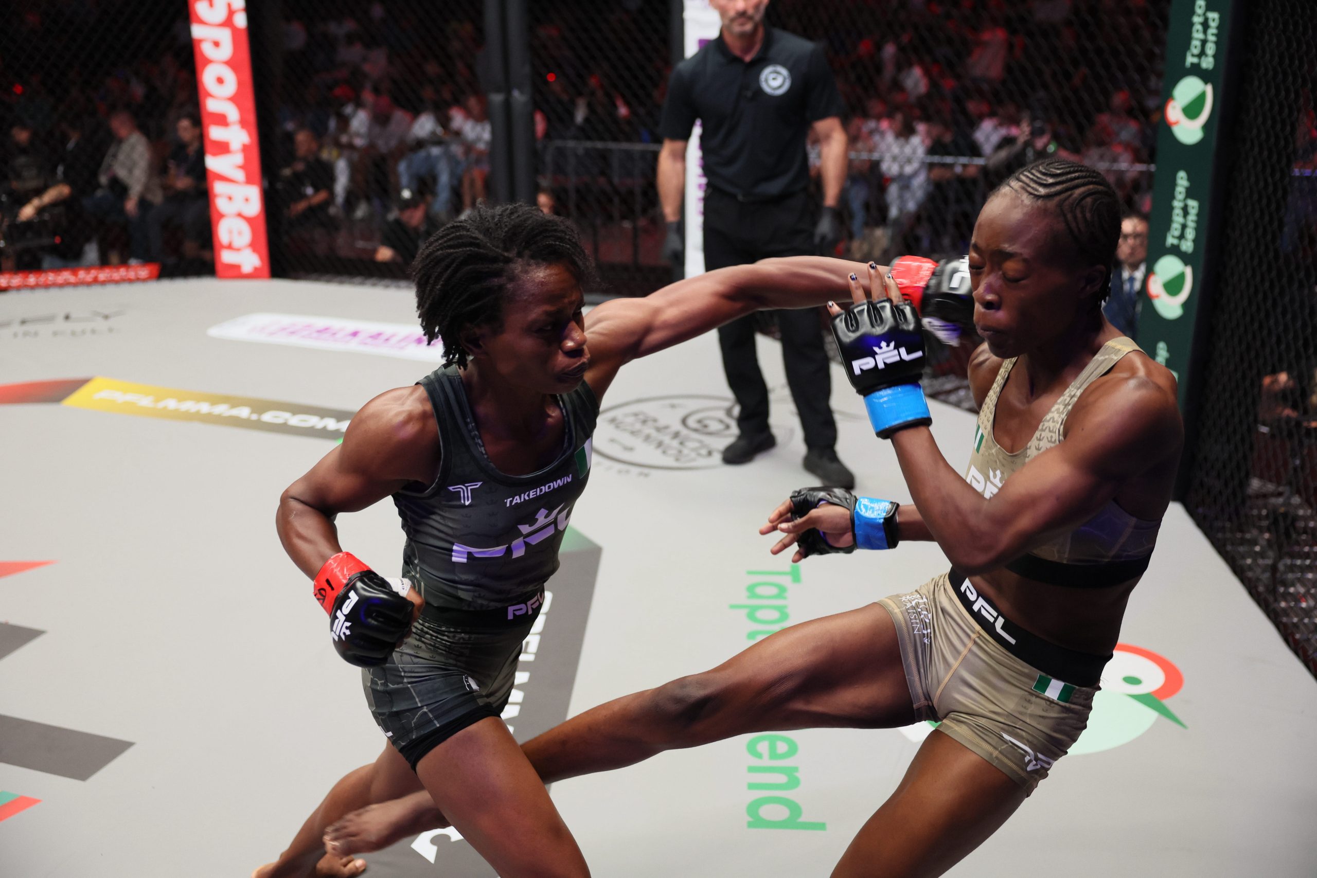 Women's MMA fighters trade a punch and a high kick during a PFL bout in the SmartCage